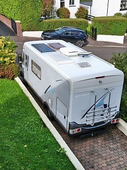 A view from above showing solar panel, aircon, satellite receiver, roof lights for lounge, bathroom  and rear bed, and cycle rack.
