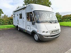 2004 Hymer B644 from front. Gas bottle access door, Habitation door with electric steps, Kitchen window..