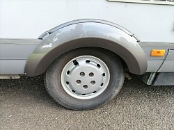 Rear right wheel arch freshly painted.