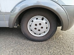 Front right wheel arch freshly painted.