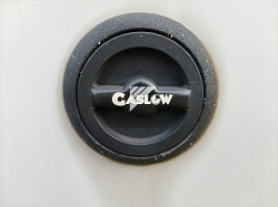 Branded dust cover cap rotates to reveal gas filler point.