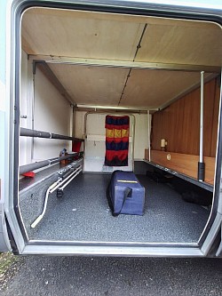 Cavernous garage with ramps, awning release tool and tensioner spring rafter. Emergency triangle. Tie down eyelets for cycle storage.