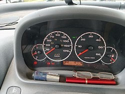 Speedo in kilometres overlaid with MPH digits for UK MOT.