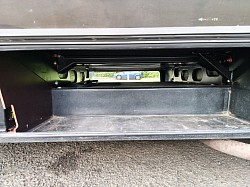 Underfloor storage through to far side.