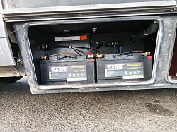 Habitation batteries. Also tap to discharge excess fresh water for travelling.
